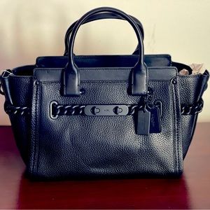 Original Coach woman’s handbag, black , high quality, size 27 ,  band new